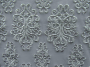White Fancy Embroidery with Scalloped Sides on Polyester Mesh