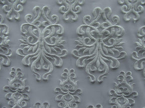 White Fancy Embroidery with Scalloped Sides on Polyester Mesh