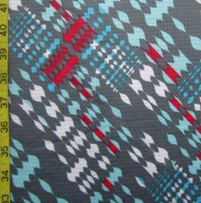 Multi-Colored Perforated Diagonal Pattern Print on Polyester Spandex