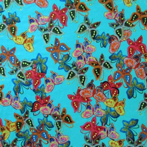 Multi-Colored Butterflies on Blue Print on Polyester Spandex