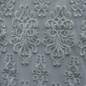 White Heavy Embroidery Lace On Mesh With Scalloped Sides Fabric